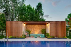 Jardín con piscina diseñado por Pia Paisajimo