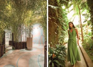 Espacio Bathco por Andreína Raventós en Casa Decor 2025 con abundante vegetación y diseño orgánico, junto a modelo de Redondobrand con vestido verde en entorno natural